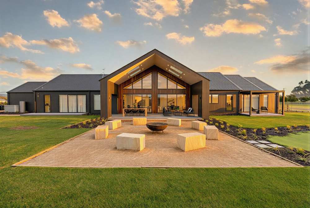 image upload c_limit,f_auto,w_1000 v1792459689 blogs celebrate-your-new-home-this-summer Family-bbq-outdoor-living-space.jpg