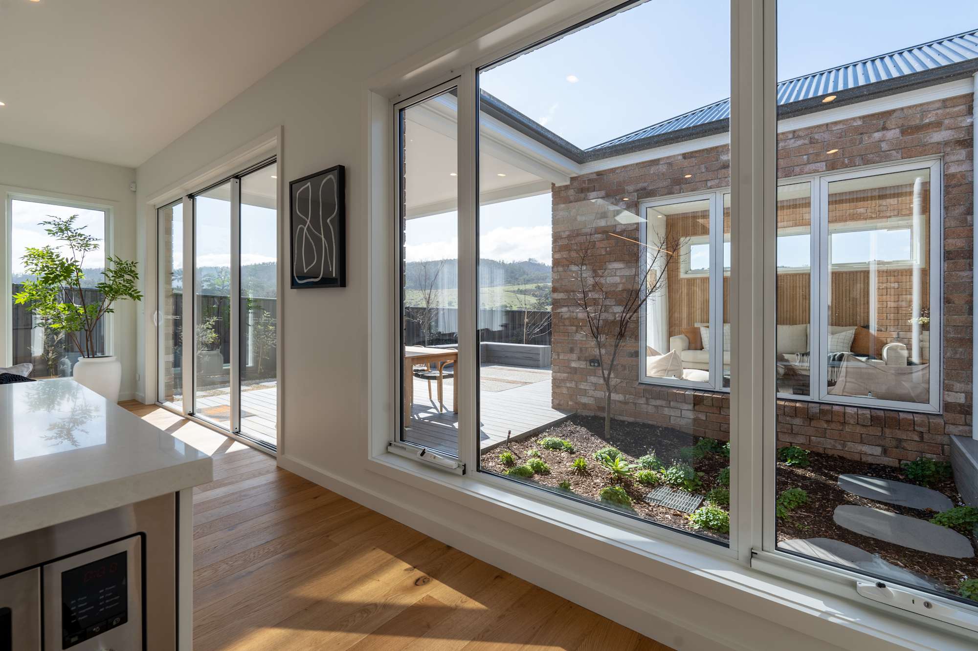 https://media.wilsonhomes.com.au/image/upload/v1783312337/content-images/about-us/architectural-designs/20240829_Rokeby_Kiama27-32.jpg
